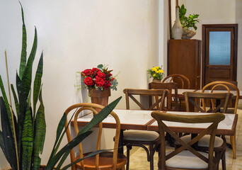 Loft style with wooden furniture in a Vietnamese coffee shop 