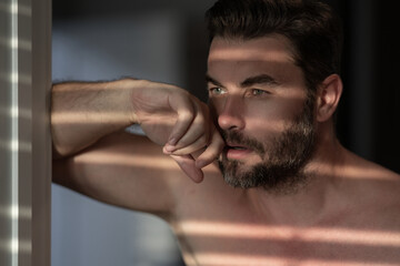 Beautiful man with clean perfect skin. Beauty male skin care. Cosmetology cosmetics beauty and spa. Male facial treatment and wellness. Male coscmetic and beauty concept. Face care, male cosmetics.