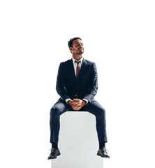 Contemplative businessman sitting on top of a block on a transparent background