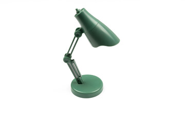 green toy table lamp isolated from the background