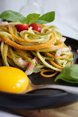 Pasta and bacon with parmesan. Homemade spaghetti pasta. On a wooden background