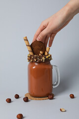Tasty fresh summer dessert - delicious chocolate milkshake
