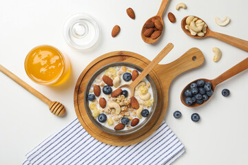 Tasty and nutritious breakfast concept - muesli with yogurt