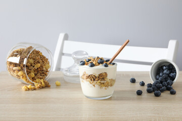 Tasty and nutritious breakfast concept - muesli with yogurt