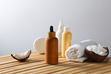 Obraz na płótnie Canvas Concept of body and skin care accessories - coconut cosmetic