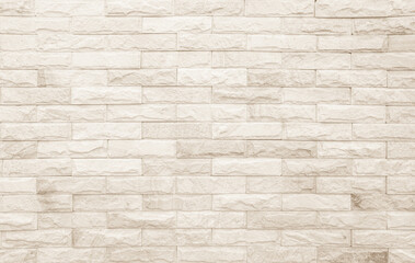 Cream brick wall texture. Old brown brick wall concrete or stone pattern nature.
