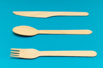 natural wood cutlery shot with shallow depth of field.