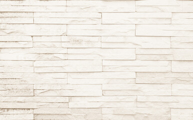 Cream and white brick wall texture background. Brickwork and stonework flooring interior rock old pattern design.