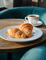 croissant and cup of coffee