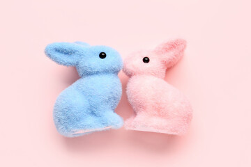 Cute bunnies for Friendship Day on pink background