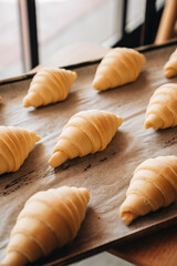 Various kind of bread with wheat top view. White bakery food concept panorama or wide banner photo.