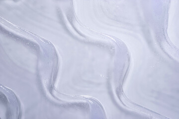 Water gel cosmetic serum, hair care or beauty calming gel smudge abstract background