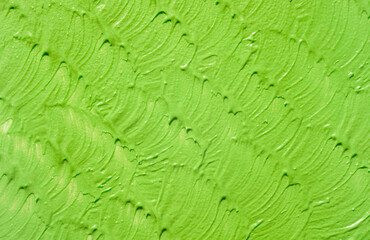 Cosmetic green clay cream or mask, toner, pigment for hair coloring mint green background 