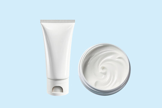 Mock-up Of A White Plastic Tube For Branding Skin Care Products And A Jar Of Moisturizing Cream On A Blue Background. Flat Lay, Top View, Copy Space.