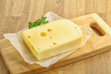 Maasdam cheese over the board