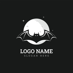 Vector silhouette of bats on moon background. Symbol of night.