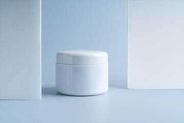 A white tube of face cream lying on an arch, marketing presentation, mock up, branding