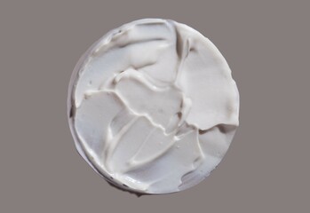 Liquid cream cosmetic smudge texture gray beige background