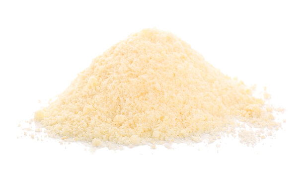 Heap of tasty grated Parmesan cheese on white background, closeup