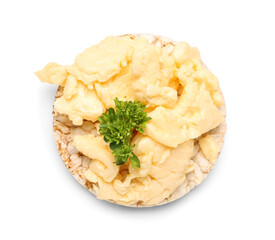 Puffed rice cracker with scrambled eggs on white background