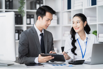 Business team meeting present.professional investor working with new startup project. Finance managers task.Digital tablet laptop computer design smart phone in morning light.