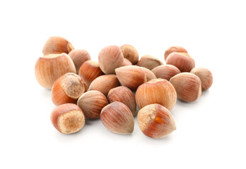 Shelled hazelnuts on white background