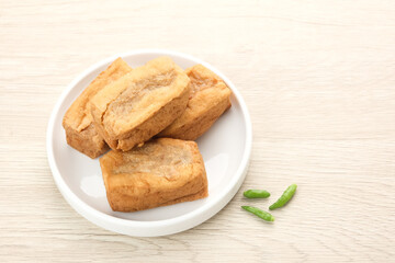 Tahu Bakso, made from tofu filled with meatball dough, served with chili. Indonesian traditional food 
