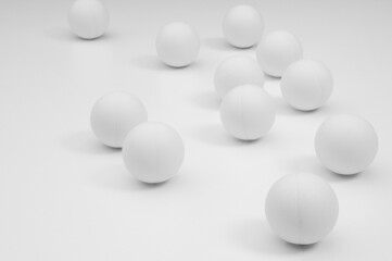 a collection of white ping pong balls on a white background
