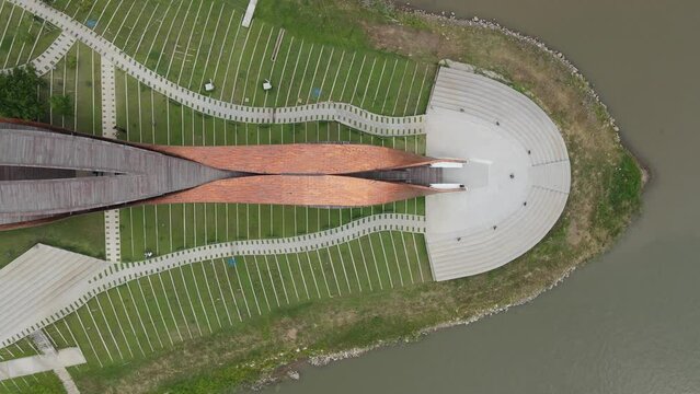 Aerial view of Pa San bridge (or Pasan bridge), the iconic building of the beginning of the Chao Phraya River, a new landmark of Pak Nam Pho in Nakhon Sawan, Thailand. 4K Footage video