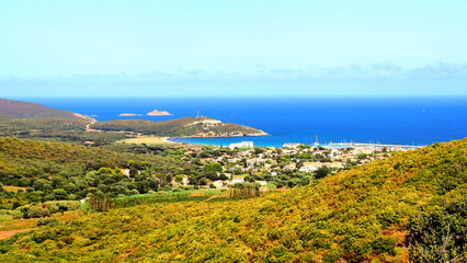 Fototapeta na wymiar panoramic view of the bay of macinaggio sheltering the marina and the beach of Rogliano near Cap Corse, in Corsica nicknamed the island of beauty