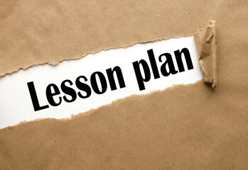 text on torn paper .text in black font on white page : Lesson Plan