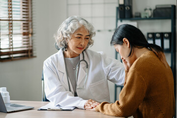 Psychology, depression. Suffering asian old woman, consulting with psychologist, psychiatrist while patient counseling mental problem. Encouraging, therapy, health care..