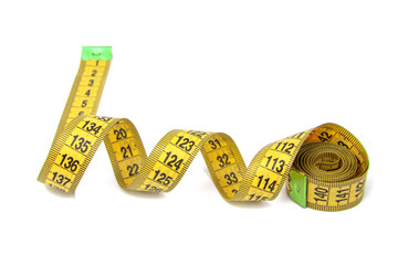 Yellow spiral tape measure diet isolated over white background clipping path.
