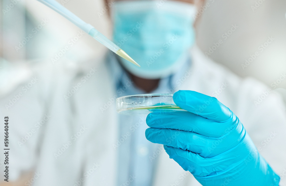 Aufkleber We run as many tests as possible. Cropped shot of an unrecognisable scientist holding a petri dish and using a dropper in the laboratory.