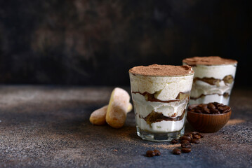 Tiramisu - italian dessert with mascarpone , biscuit and coffee.