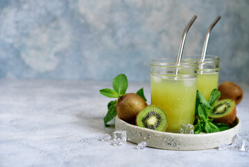 Cold green tea with kiwi and mint.