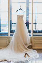 wedding dress on a hanger