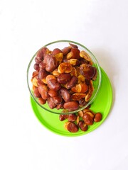 Koro beans or parang beans (Canavalia ensiformis) a traditional snack from Indonesia. Delicious and salty snack. bowl of nuts