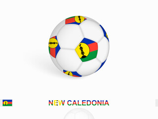 Obraz premium Soccer ball with the New Caledonia flag, football sport equipment.