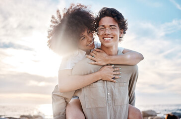 Portrait of a young mixed race couple enjoying a day at the beach looking happy and in love. Portrait of a young mixed race couple enjoying a day at the beach looking happy and in love. - Powered by Adobe