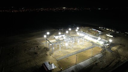 Aerial shot of Electrical Substation in the night 