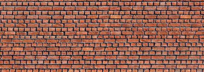 Old red brick wall. Panoramic brickwork texture