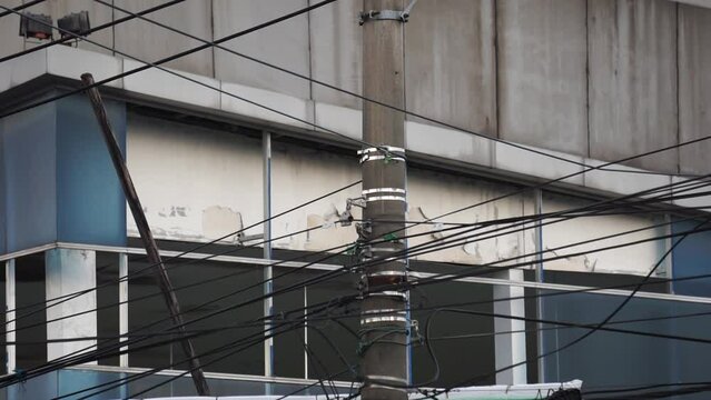 Electric cable network with a sky background