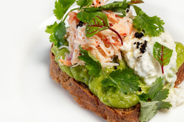 Bruschetta with poached egg and crab meat