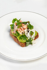 Bruschetta with poached egg and crab meat