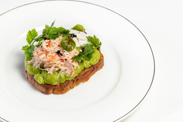 Bruschetta with poached egg and crab meat