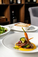Fried liver with vegetables and pumpkin puree