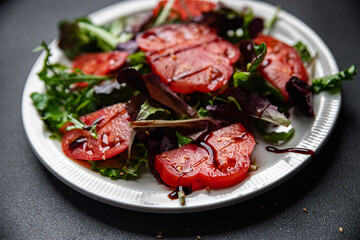 tomato slice salad meal food snack on the table copy space food background rustic top view 