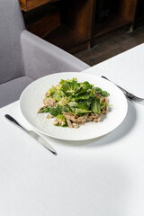 Mix salad with chicken and parmesan