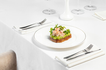 Bruschetta with poached egg and crab meat